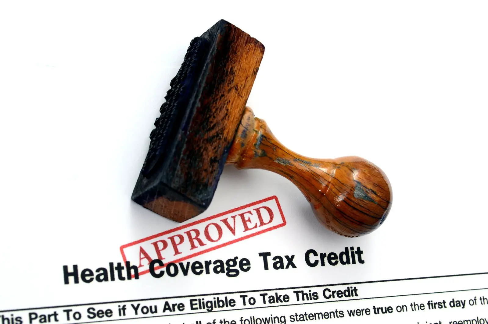 How the Health Insurance Premium Tax Credit Affects Your 2014 Return